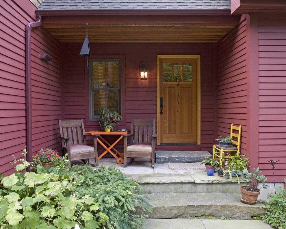 Front Stoop for a Rustic Porch with a Wind Chime and Housatonic Cape by Habitat Post & Beam, Inc.