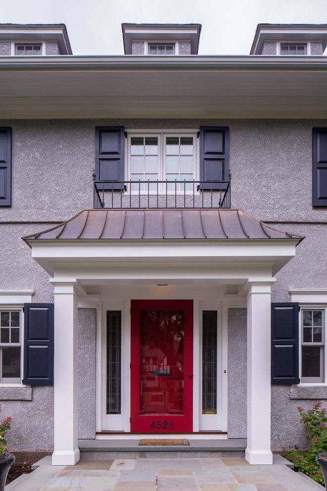 Front Stoop for a Traditional Entry with a Red Front Door and Traditional Entry by Quartersawndesignbuild.com