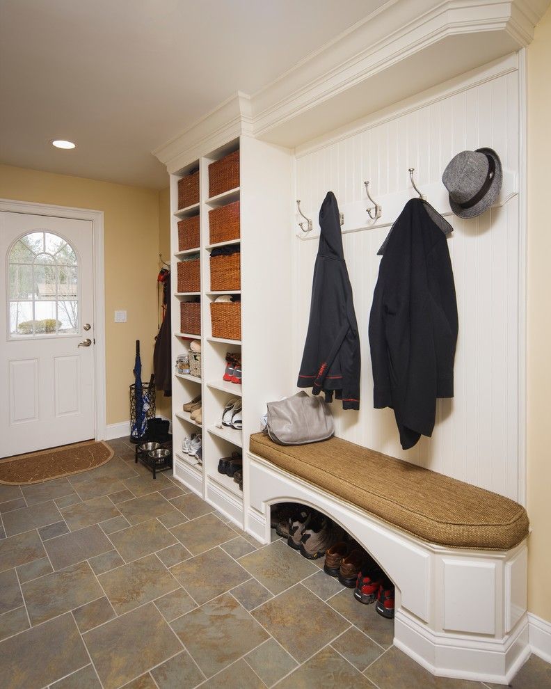 Fuda Tile for a Traditional Entry with a Mud Room and Warm and Welcoming by Creative Design Construction, Inc.