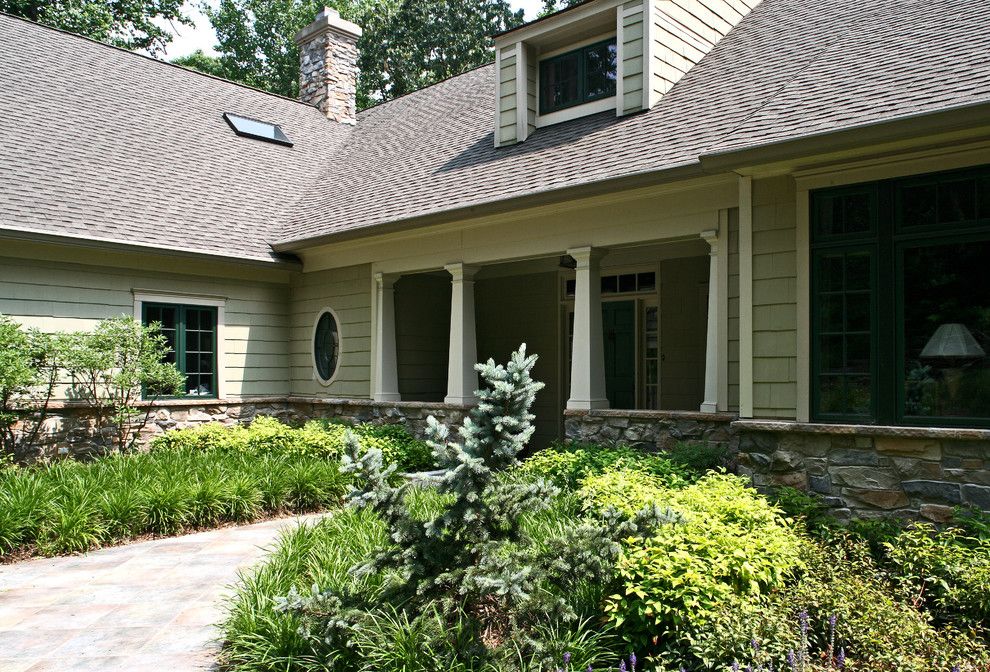 Gaf Shingles for a Craftsman Exterior with a Stone Facade and Hill Farm by Penza Bailey Architects