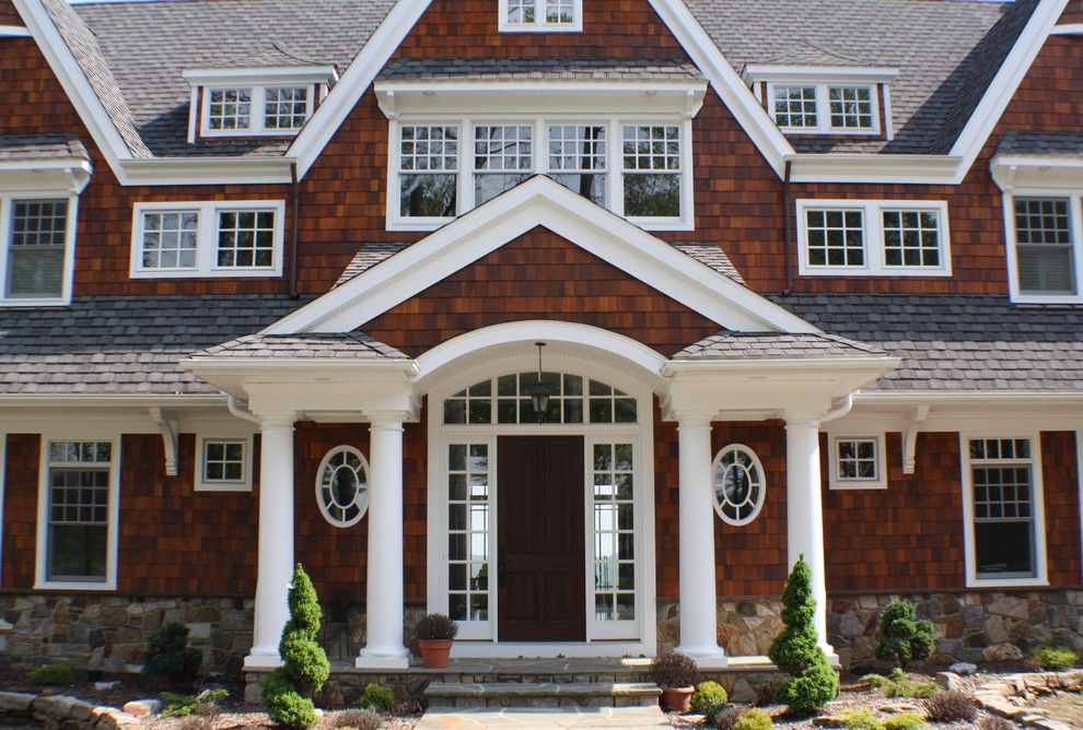 Gaf Shingles for a Victorian Exterior with a French Window and Street, Md by Custom Home Group