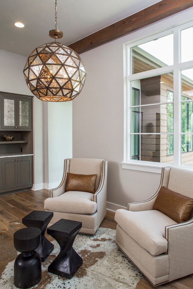 Galleria Furniture for a Transitional Family Room with a Copper Pillows and Luxury Home Magazine Parade of Homes by Kelle Contine Interior Design, Llc