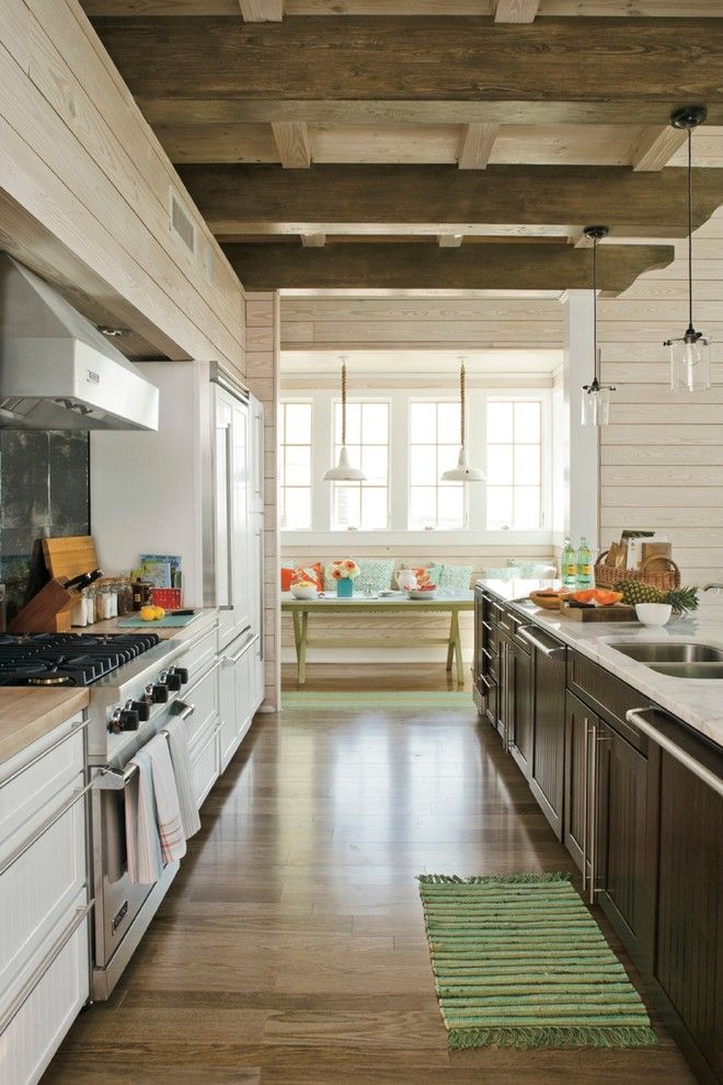 Galley Sink for a Beach Style Kitchen with a White Countertop and Southern Living Photos by Southern Living