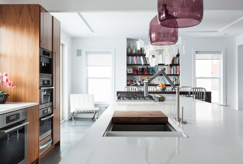 Galley Sink for a Contemporary Kitchen with a Floating Shelves and Modern Home in the Middle of St. John's by Becki Peckham