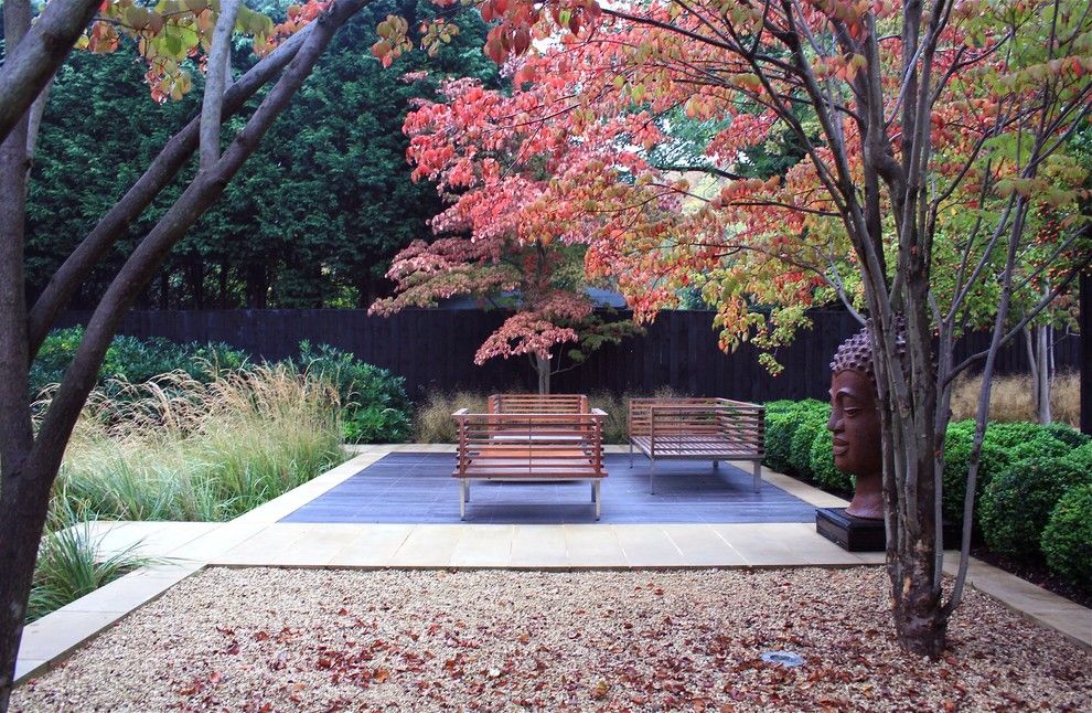 Gardiners Furniture for a Contemporary Patio with a Garden Art and the Woodyard, Dulwich, London by Annie Pearce