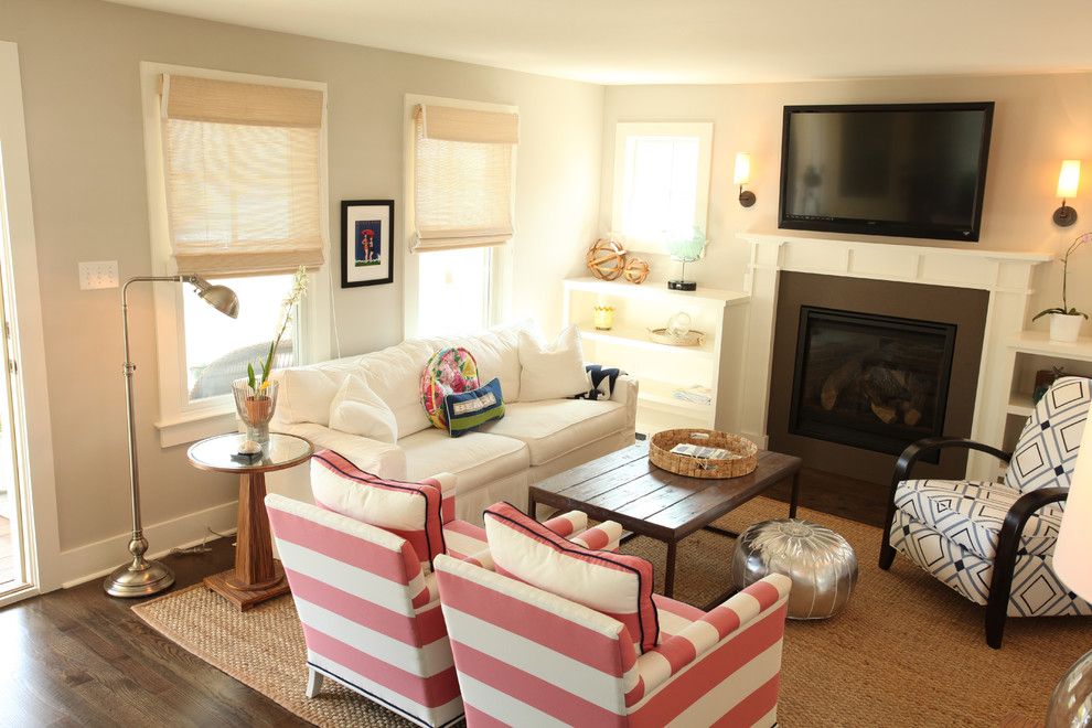 Gardner White Clearance for a Beach Style Living Room with a Fireplace and Beach Cottage Renovation by Kelley Gardner