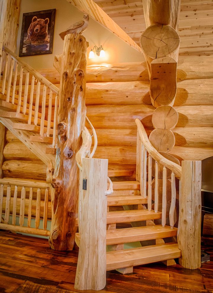 Gastineau Log Homes for a Rustic Staircase with a Mountain Resort and 2013 Parade Home Moose Ridge Cabin Log Home by Mountain Log Homes & Interiors