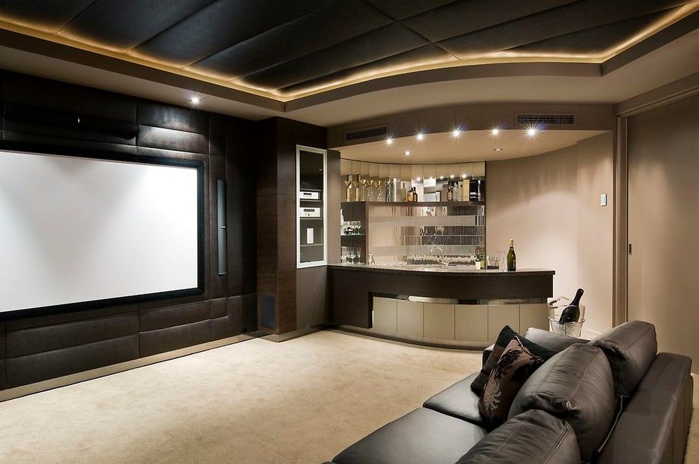 Gehan Homes for a Transitional Home Theater with a Mirrored Backsplash and the Resort by Zorzi