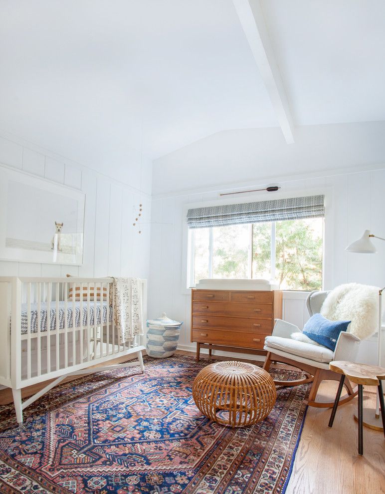 Gender Neutral Nursery for a Contemporary Nursery with a Rocking Chair and Rustic Road by Amber Interiors