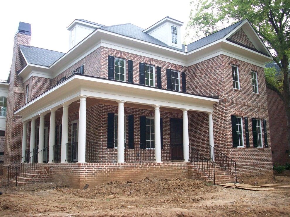 General Shale Brick for a Traditional Exterior with a Brick and Exterior by Hickman Construction Company, Inc.