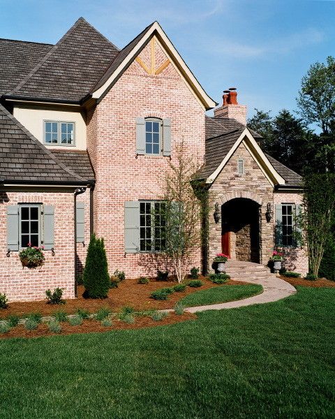 General Shale Brick for a Traditional Exterior with a Cypress Shutters and Hill Residence by Missy Caulk, Allied Asid