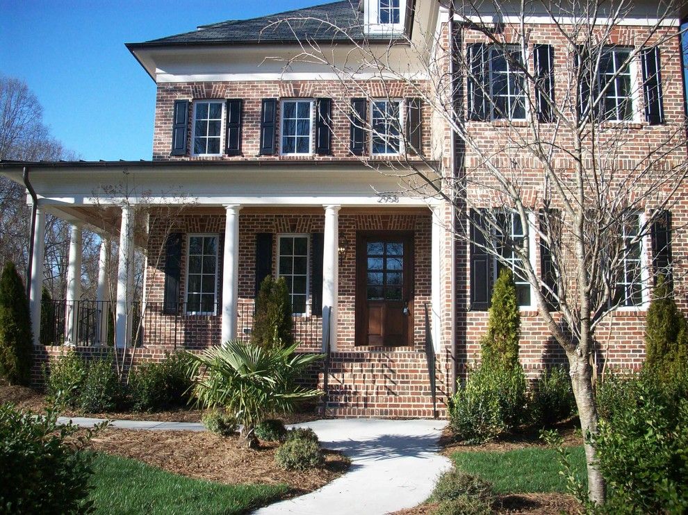 General Shale Brick for a Traditional Exterior with a Stone Facade and Exterior by Hickman Construction Company, Inc.