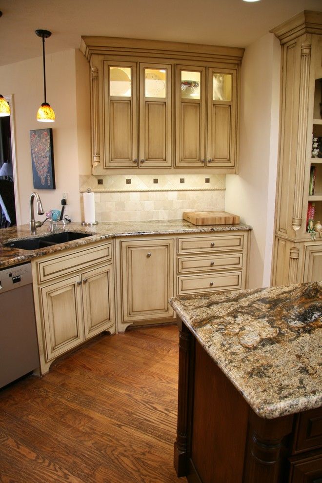 Glazing Cabinets for a Traditional Kitchen with a Glass Uppers and Brushy Creek Kitchen by Hatfield Builders & Remodelers