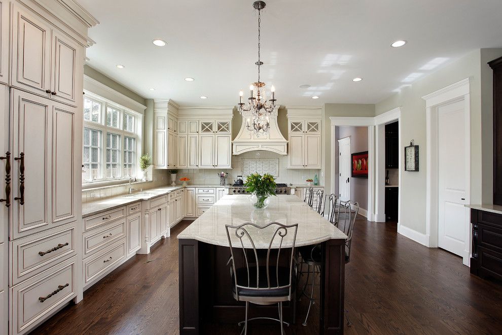 Glazing Cabinets for a Traditional Kitchen with a Metal Barstools and Design/build Winnetka by Sterling Wilson Design