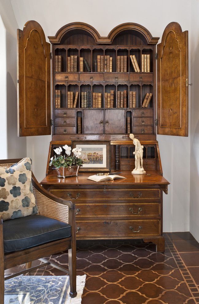 Godby Furniture for a Mediterranean Living Room with a Floor Tile and Living Room Antique Secretary by Dayna Katlin Interiors