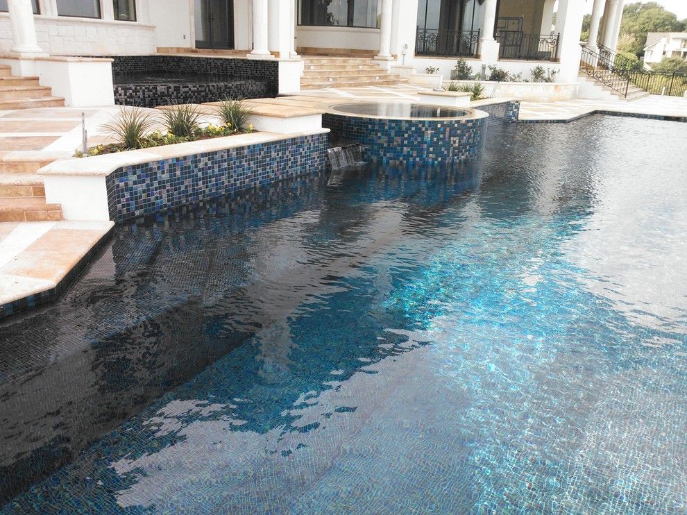 Gold Medal Pools for a Contemporary Pool with a All Tile and Large All Tile Pool by Ocean Quest Pools by Lew Akins