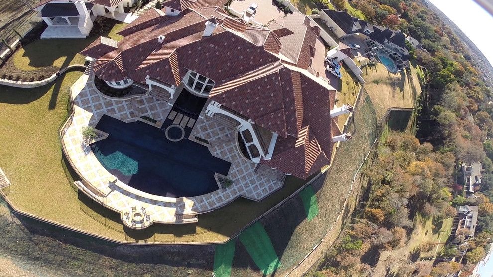 Gold Medal Pools for a Contemporary Pool with a Beach Step and Large All Tile Pool by Ocean Quest Pools by Lew Akins