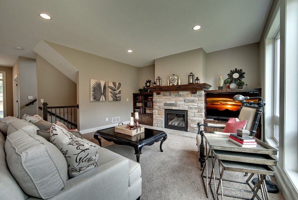 Gonyea Homes for a Traditional Living Room with a Media Wall and Living Room – Emerald Falls – 2014 Spring Parade by Gonyea Homes & Remodeling