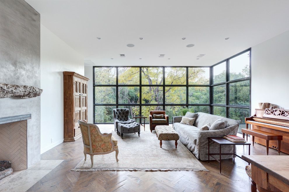 Gonzalez Furniture for a Contemporary Living Room with a Wall of Windows and Bouldin Creek Residence by Restructure Studio