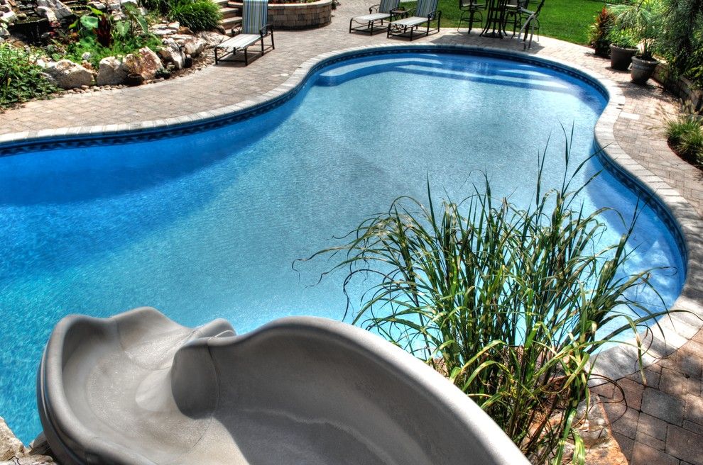 Goodall Pools for a Tropical Pool with a Tropical and Outdoor Pool with Lounge by Goodall Pools & Spas