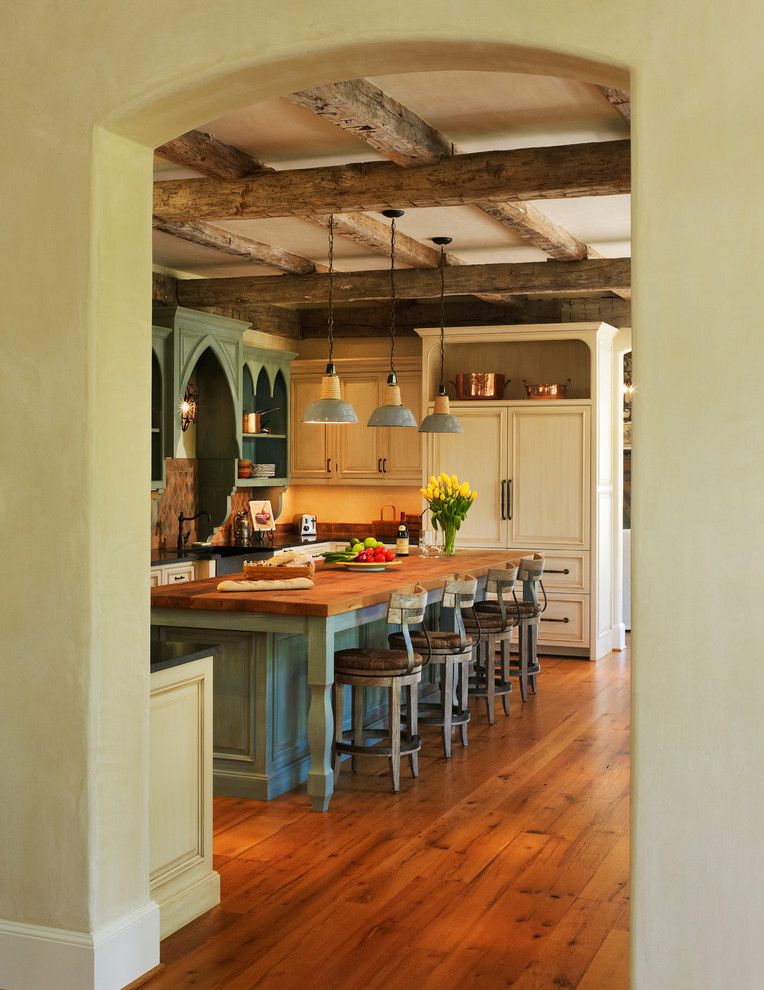 Gothic Cabinet for a Mediterranean Kitchen with a Retro Swivel Chairs and New Country French Cottage by Barnes Vanze Architects, Inc