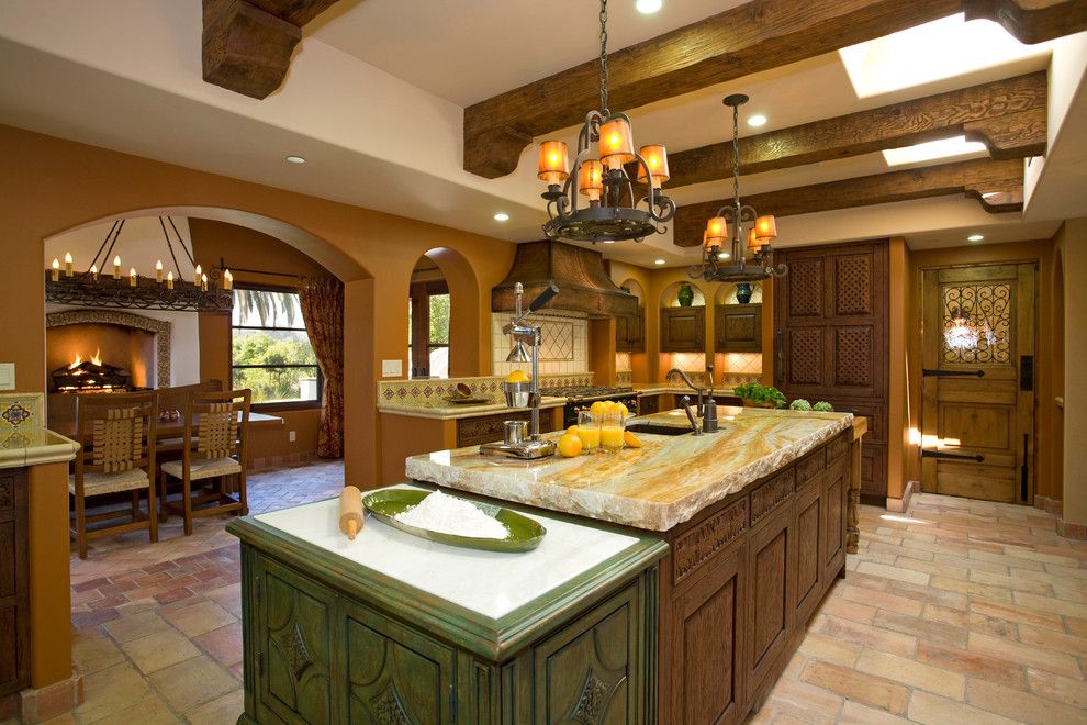 Granite Countertop Edges for a Mediterranean Kitchen with a Exposed Wood Beams and Haute Hacienda by Hamilton Gray Design, Inc.