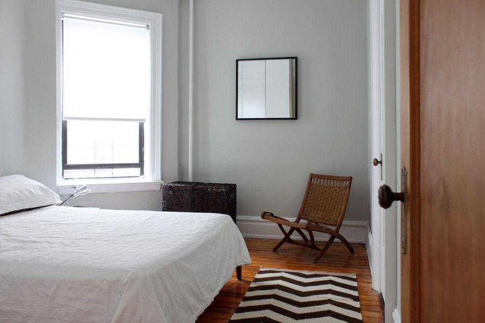 Gray Owl Benjamin Moore for a Modern Bedroom with a Chair and Brooklyn Apartment by Maletz Design