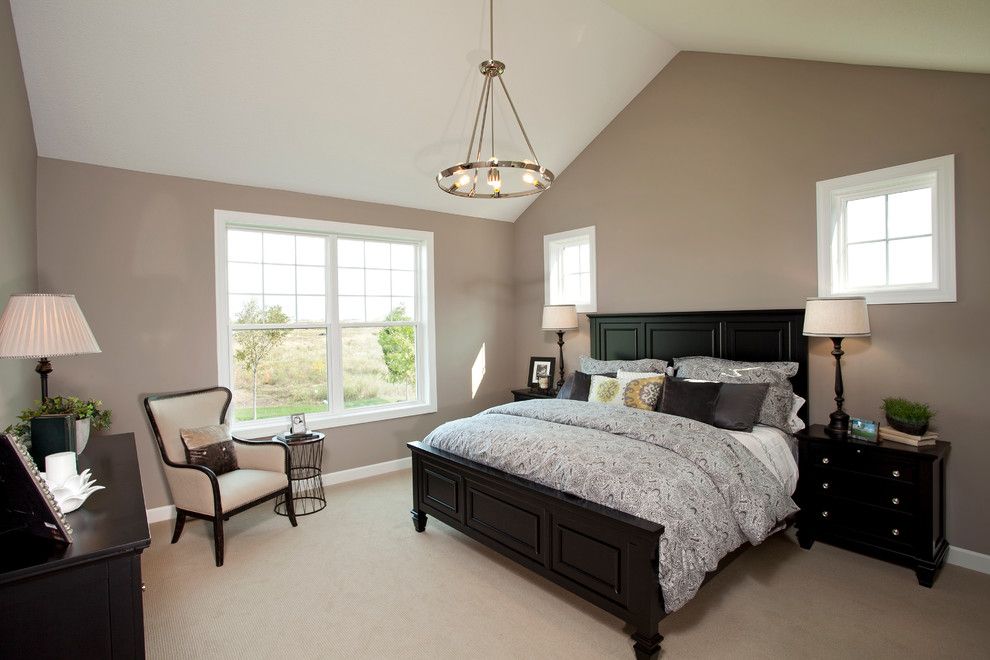 Greige Paint for a Traditional Bedroom with a Beige Carpet and the Arlington Ii by Homes by Tradition