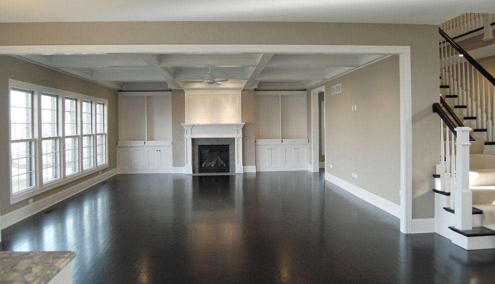 Greige Paint for a Traditional Family Room with a Coffered Ceilings and Custom Floor Plan Aps Family Room by King's Court Builders, Inc.