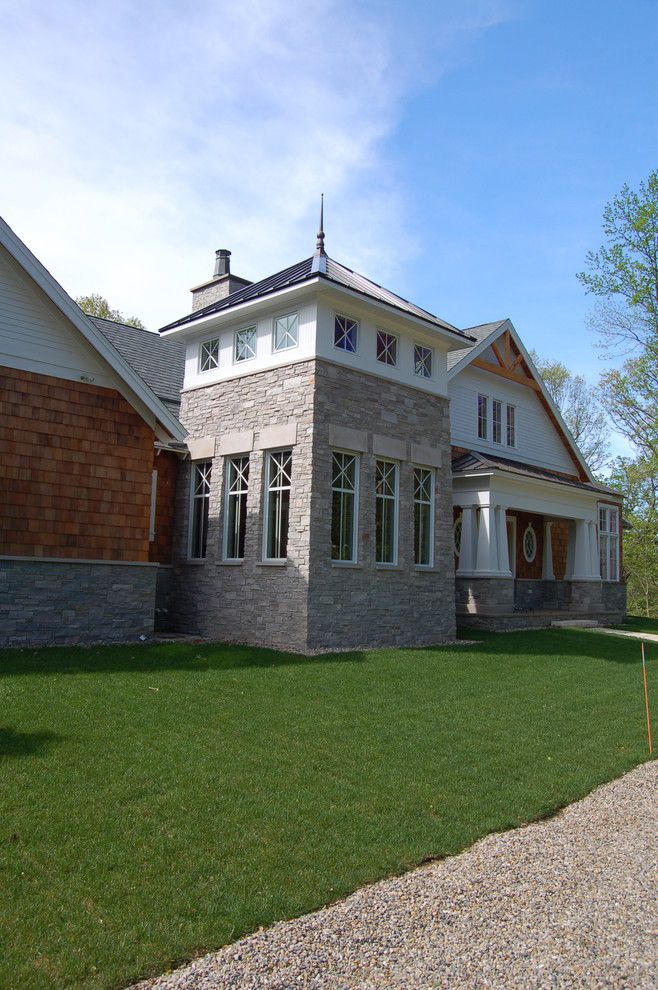 Halquist Stone for a Craftsman Exterior with a Cedar Shingles and Exterior Images by Hibler Design Studio