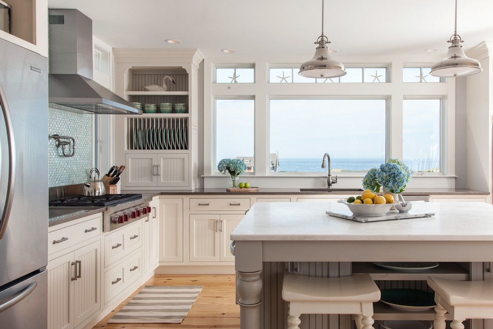 Handsome Cabinets for a Beach Style Kitchen with a White Bar Stools and Dennis Bayview Cape by Reef Cape Cod's Home Builder