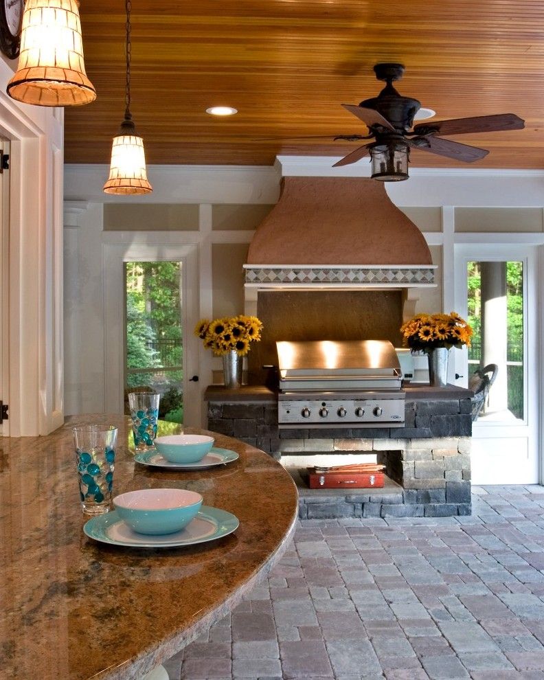 Hanover Pavers for a Mediterranean Pool with a White Cabinet and Poolside Paradise by Teakwood Builders, Inc.