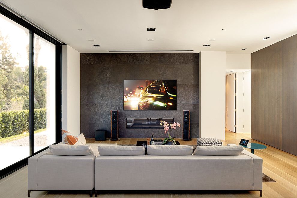 Happe Homes for a Modern Family Room with a Modern Furniture and Family Rooms by Magnolia Design Center