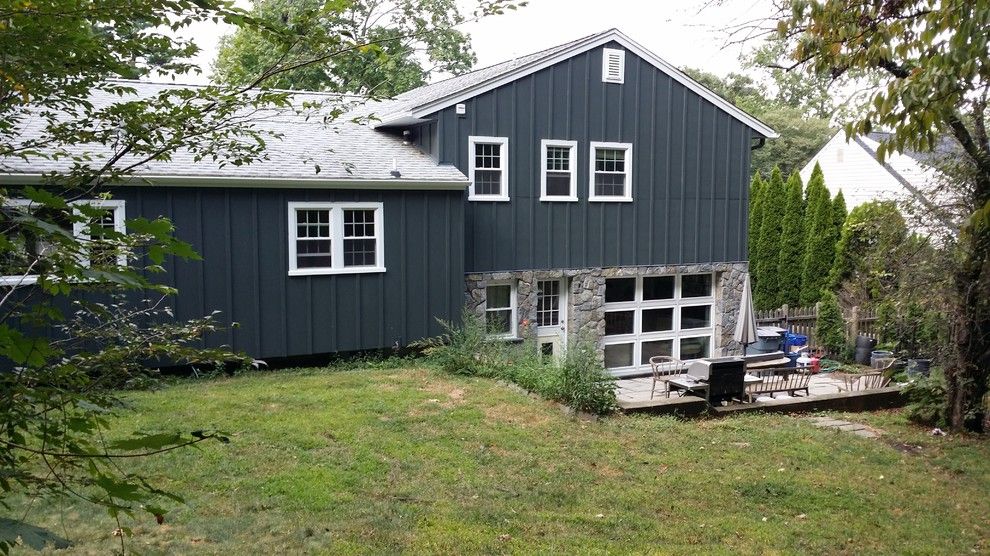 Hardiepanel for a Traditional Exterior with a Color Change and Iron Grey Hardiepanel Board and Batten by Burr Roofing Siding Windows