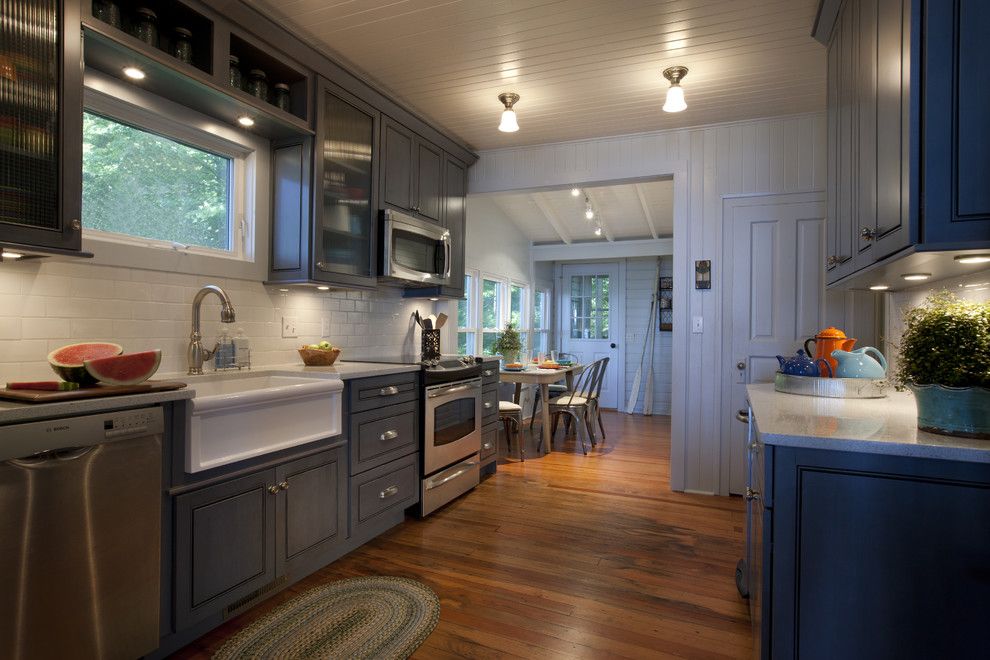 Herbeau for a Traditional Kitchen with a Wood Cabinets and Lake Cottage Kitchen by Michael Abrams Limited