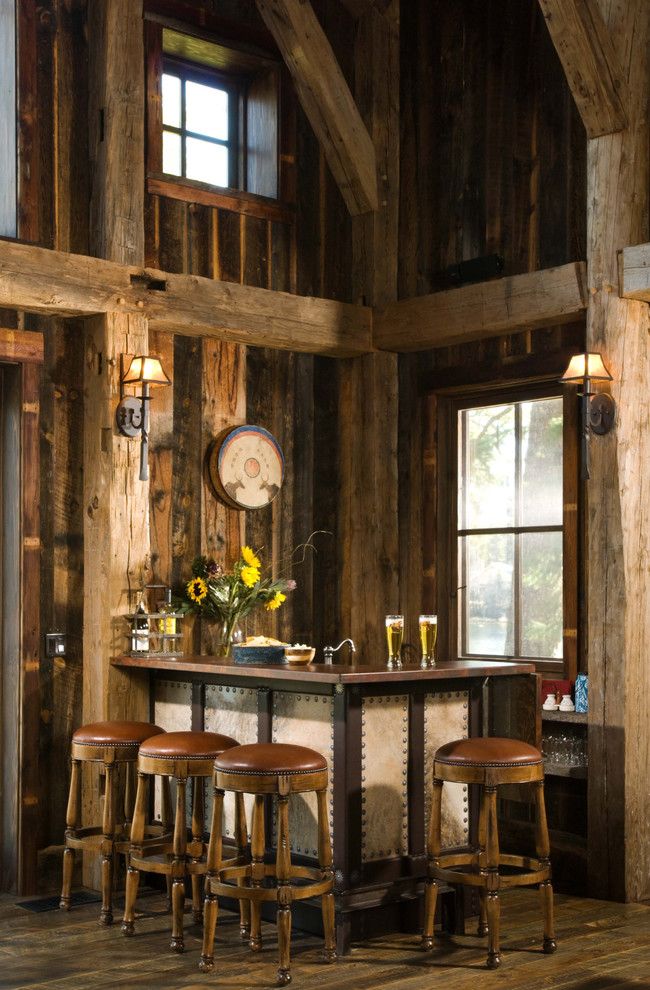 Heritage Homes Fargo for a Rustic Home Bar with a Leather Barstools and Heritage Cabin by Rmt Architects