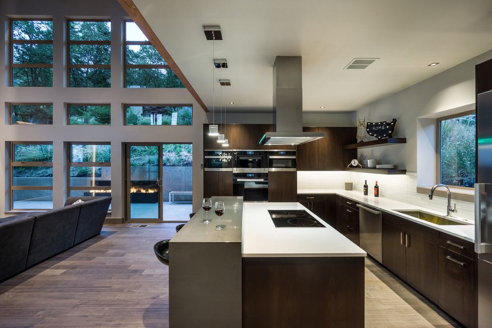 Hermitage Lighting for a Contemporary Kitchen with a Floor to Ceiling Windows and Partnering with Jordan Iverson by Maxim Lighting International