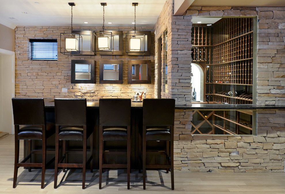 Hermitage Lighting for a Contemporary Wine Cellar with a Counter Stools and Hermitage Residence by Besch Design, Ltd.