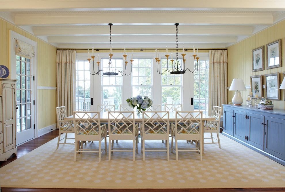 Hickory Chair for a Beach Style Dining Room with a Chandelier and Michigan Summer Home by Tom Stringer Design Partners