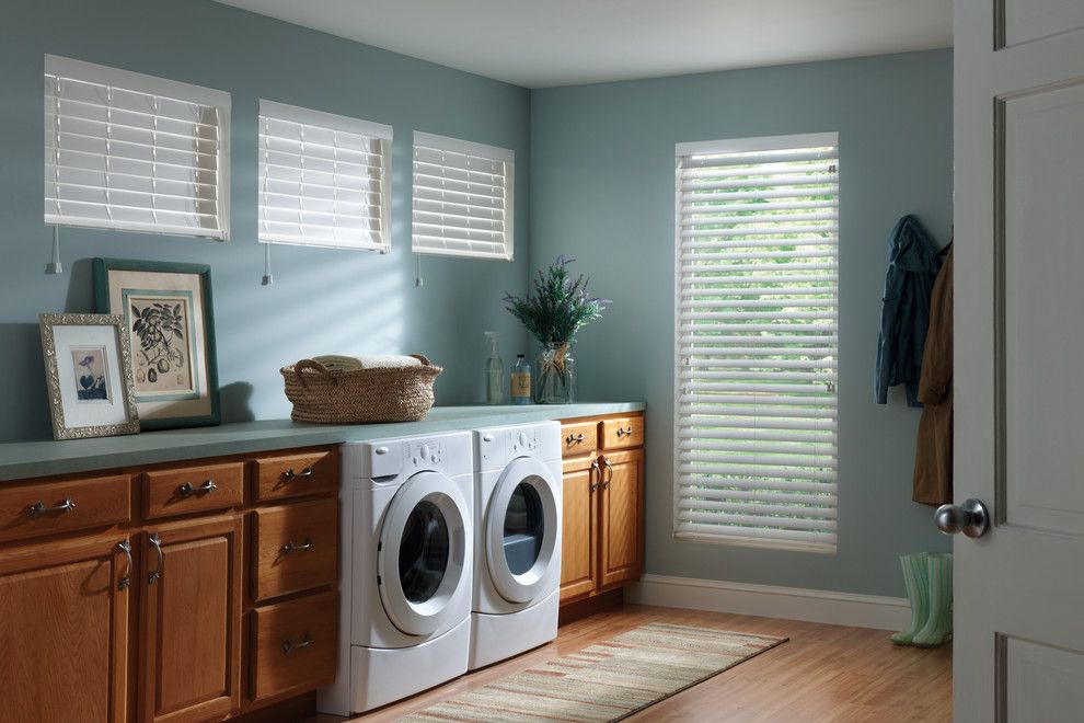 Hive Modern for a Traditional Laundry Room with a Wood Blinds and White Faux Wood Blinds by Budget Blinds