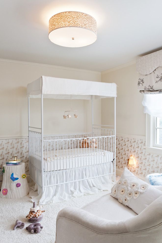 Holland and Sherry for a Traditional Nursery with a White Crib and Greenwich Modern Tudor by Marks & Frantz Interior Design