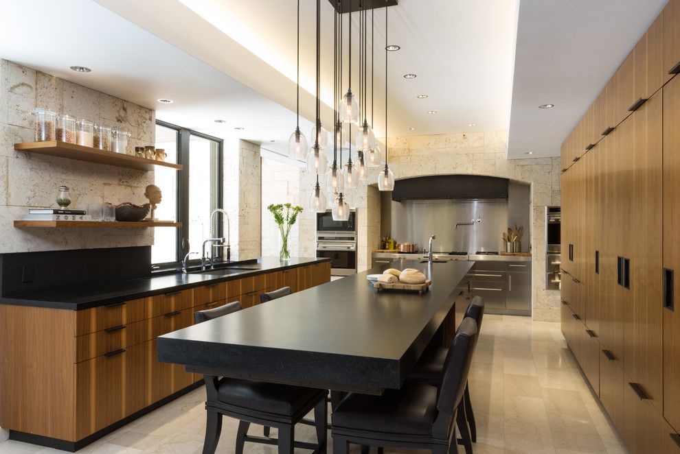 Holly Hunt Lighting for a Modern Kitchen with a Wolf Range and Modern Scientist Residence by Touzet Studio