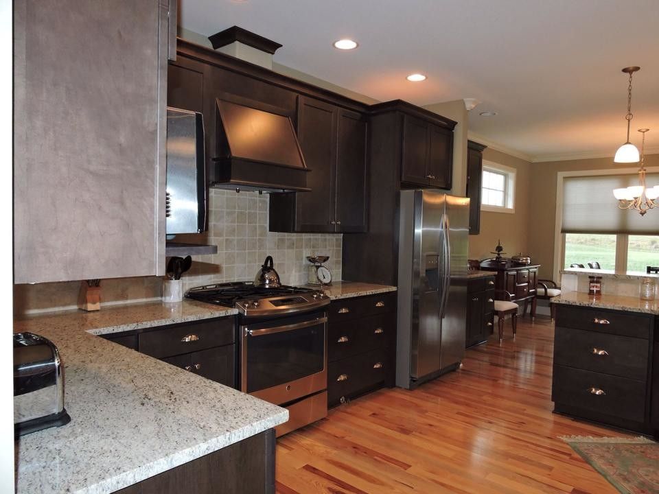 Homecrest Cabinets for a  Spaces with a Raised Bar Top Seating and Angela Raines Designs by Kitchen Sales Gallery