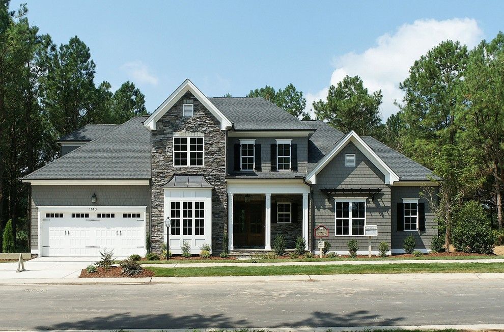 Homes by Dickerson for a Traditional Exterior with a Flagstone and the Oakmont Built by Homes by Dickerson at Carrie's Reach & Heritage by Homes by Dickerson