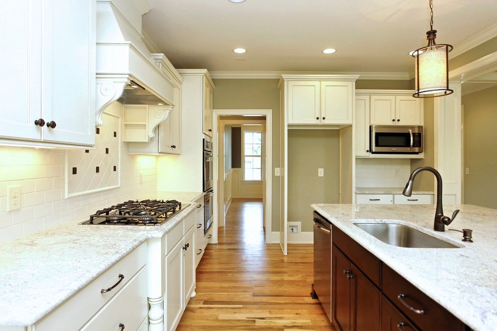 Homes by Dickerson for a Transitional Kitchen with a Dark vs Light Cabinets and the Madison Built by Homes by Dickerson by Homes by Dickerson