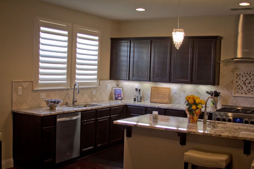 Horizons Window Fashions for a Traditional Kitchen with a Composite Shutters and Plantation Shutter Projects by Horizon Window Fashions