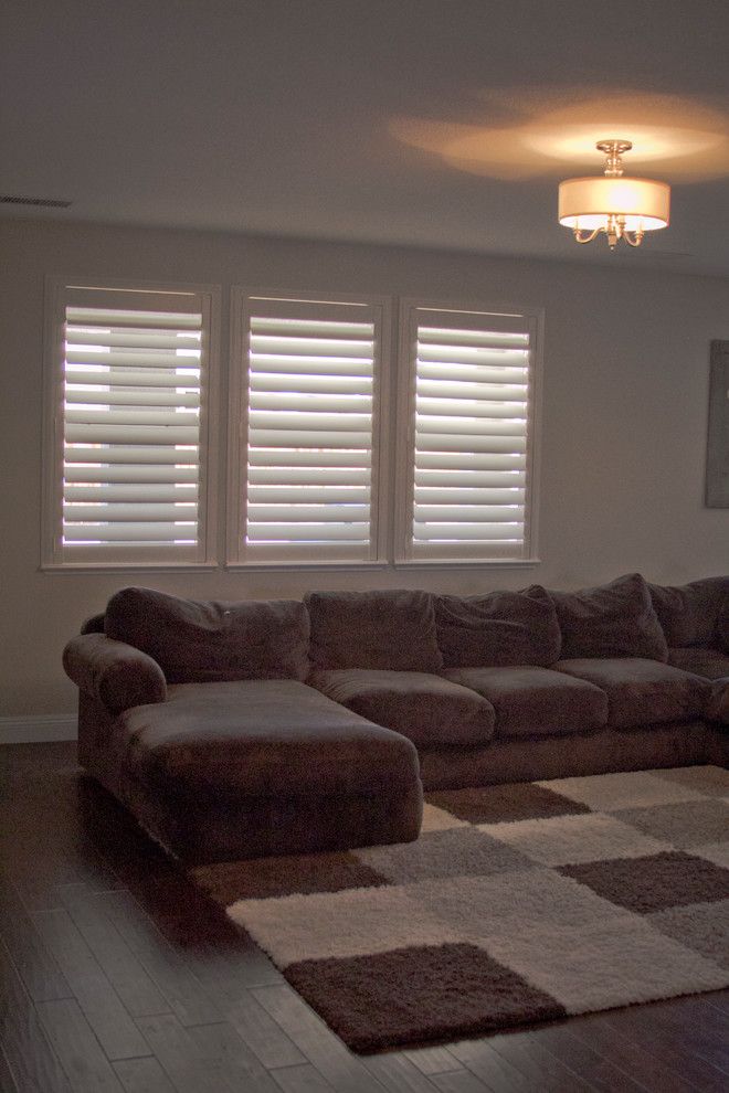 Horizons Window Fashions for a Traditional Living Room with a Shutters and Plantation Shutter Projects by Horizon Window Fashions