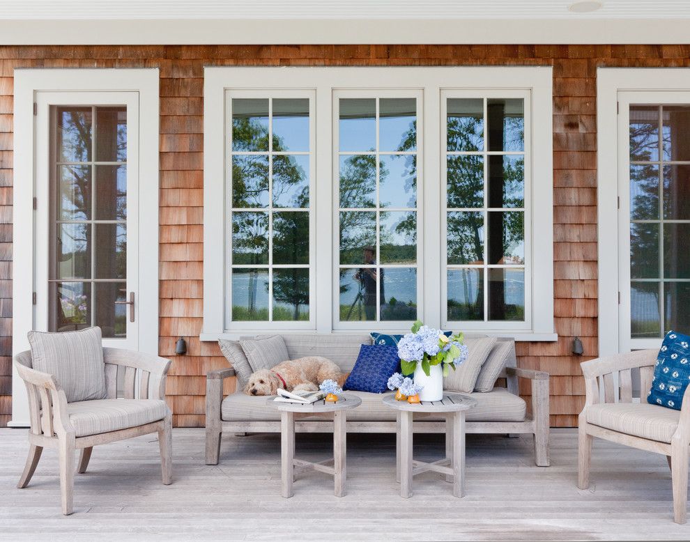 House Hunting Checklist for a Beach Style Porch with a Wood Outdoor Table and Shelter Island Beach House by Wettling Architects