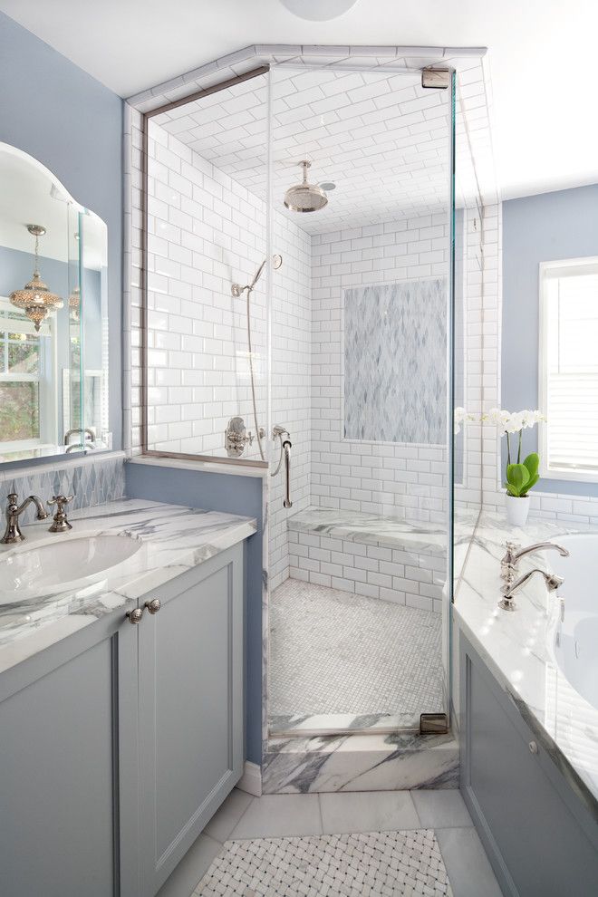 How to Clean Shower Grout for a Beach Style Bathroom with a Vanity and Shower at Master Bath by Lauren Shadid Architecture and Interiors