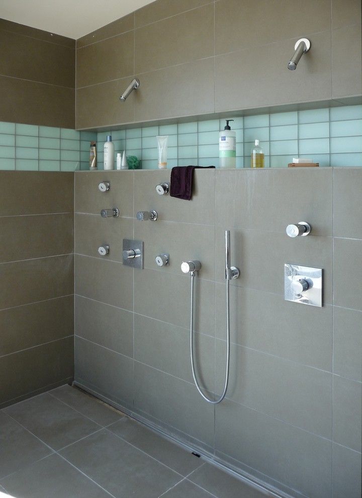 How to Clean Shower Grout for a Modern Bathroom with a Double Shower and Bodega Bay Master Bath by Oberhauser Interiors